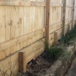 Kiwi classic fence on retaining wall